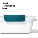 Clear OXO Good Grips sandwich container with leakproof lid, designed for tall sandwiches; BPA-free and dishwasher safe.