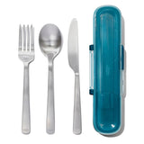 Eco-friendly OXO Good Grips reusable utensil set with fork, knife, spoon in a compact teal travel case for on-the-go dining.