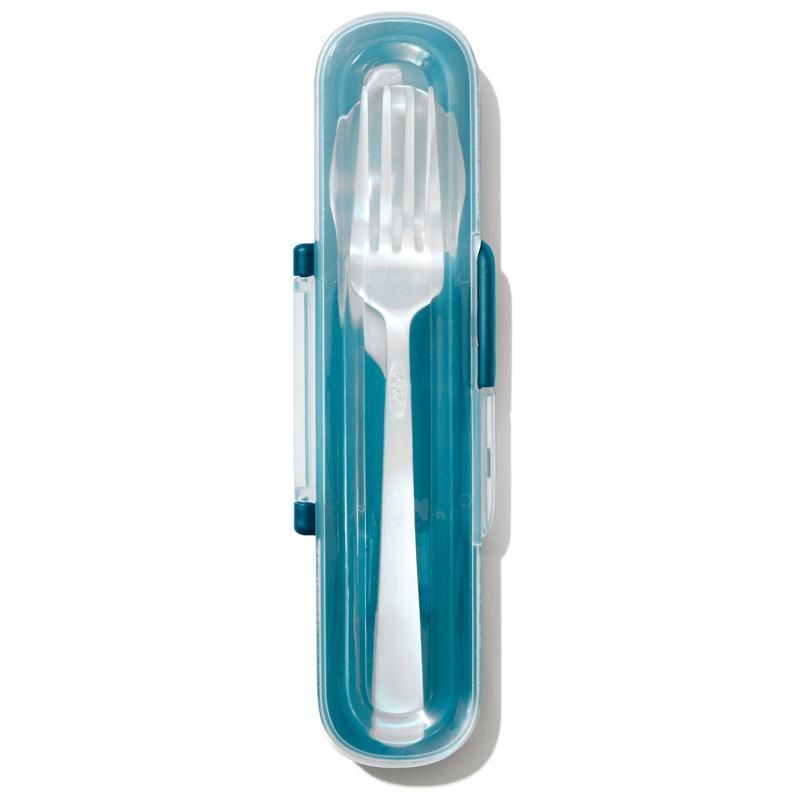 Compact OXO Good Grips reusable utensil set in teal case, featuring stainless steel fork, knife, and spoon for eco-friendly dining.