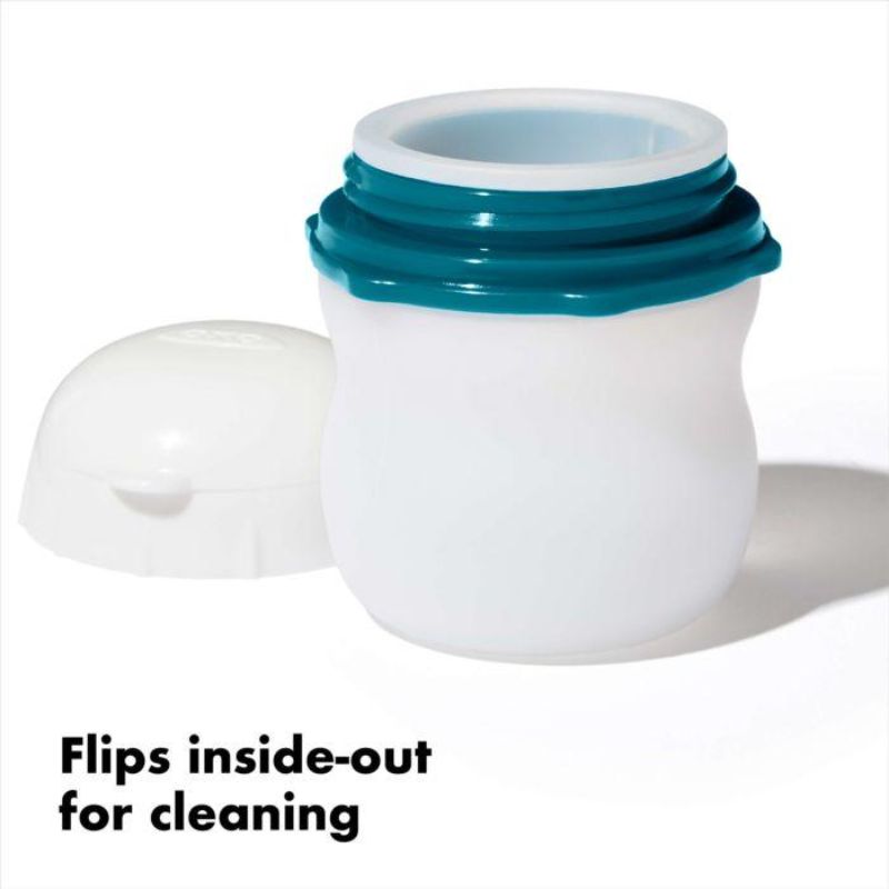 Two OXO Good Grips silicone squeeze bottles, ideal for dressings and toiletries, with leakproof lids and a wide mouth for easy filling.