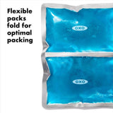 Reusable ice pack set by OXO with dual-compartments, ideal for keeping food fresh on the go for lunches and picnics.