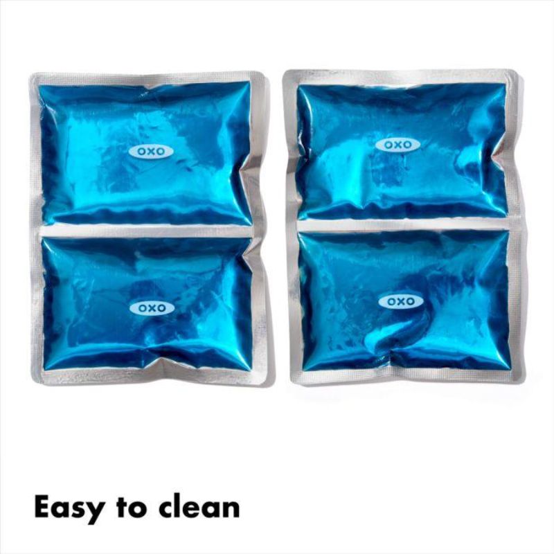 Reusable dual-compartment ice pack set for keeping food cool on the go, ideal for lunches, picnics, and road trips.