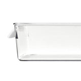 Clear OXO refrigerator storage bin for organizing fruits, vegetables, and meal prep essentials; smooth base for easy gliding.