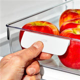 Clear OXO Refrigerator Storage Bin (20 x 38 x 8cm) for organizing produce, featuring smooth gliding base and rounded handle.