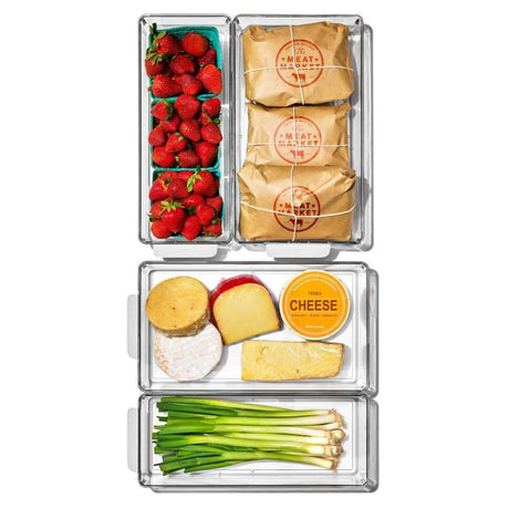 Set of 4 clear OXO refrigerator storage bins with handles for easy organization and visibility of food items.