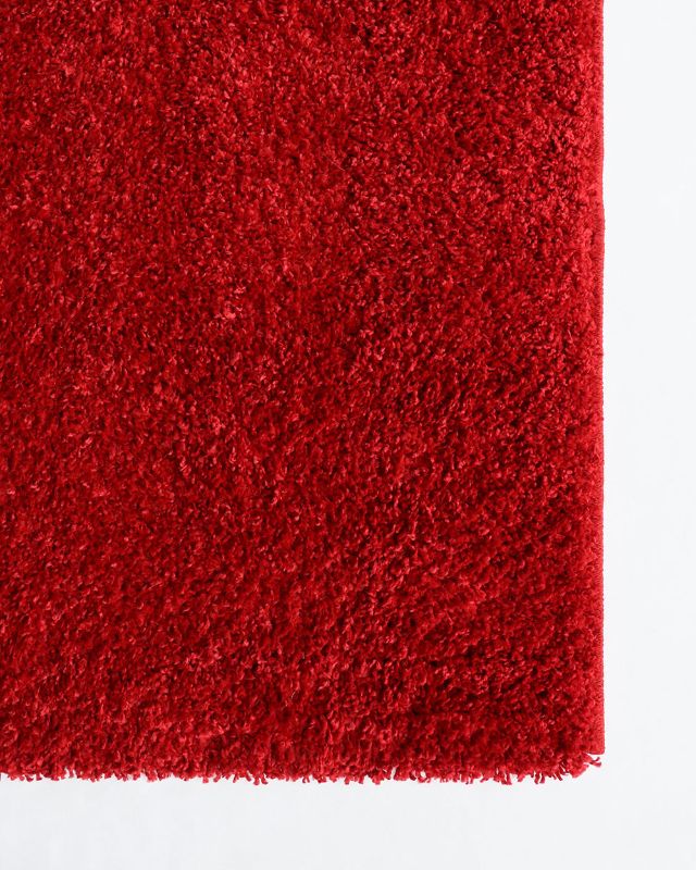 Soft taupe and black shaggy rug, 160x230cm, ideal for busy homes with its luxurious feel and durable polypropylene material.
