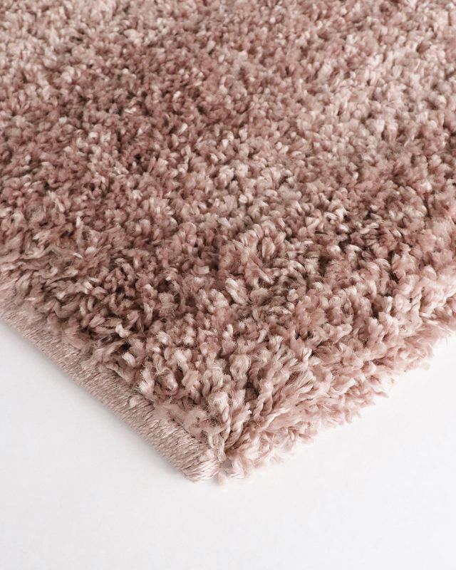 Taupe and black 200x290cm Stirling floor rug with plush 30mm shag pile, perfect for enhancing modern and traditional spaces.
