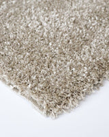 Taupe and black Stirling floor rug, 200x290cm, features a soft 30mm shaggy pile, perfect for any modern or traditional space.