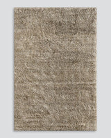 Soft almond shaggy rug measuring 200x290cm, perfect for enhancing modern and traditional interiors with comfort and style.