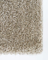 Shaggy Almond floor rug measuring 200x290cm, offering luxury and durability for modern homes, with a soft 30mm pile.