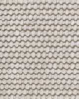 Handwoven Cyrus Floor Rug in earthy tones, 160x230cm, featuring a textured knot-style weave for comfort and elegance.