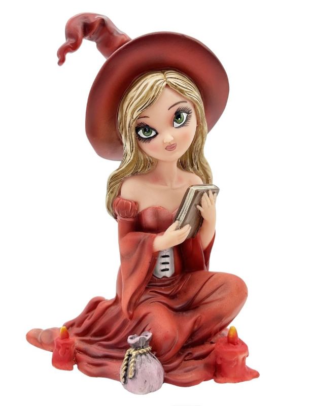 Witch figurine (15cm) engrossed in her spellbook, perfect for magical home decor or collectibles.