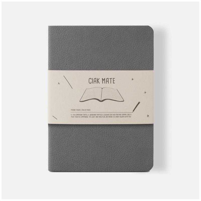 Elegant grey Ciak Mate lined notebook, 12 x 17 cm, featuring 64 cream pages and a soft vegan leather cover.