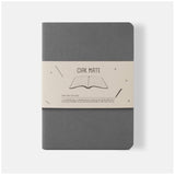 Elegant grey Ciak Mate lined notebook, 12 x 17 cm, featuring 64 cream pages and a soft vegan leather cover.