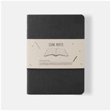 Elegant black softbound notebook with vegan leather cover and 64 lined cream pages, perfect for writing and organizing.