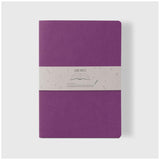 A lilac A4 lined notebook with 64 cream pages, a soft vegan cover, perfect for writing and journaling.