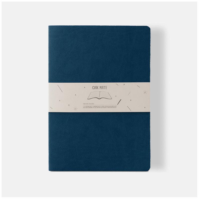 Softbound A4 blue lined notebook with vegan leather cover, featuring 64 cream-colored pages for stylish writing.