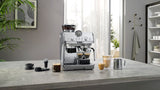 De'Longhi Arte Metal Pro Cold Brew coffee machine in stainless steel, featuring advanced cold brew technology and customizable settings.