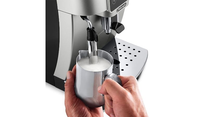 De'Longhi Magnifica Start silver-black espresso machine with integrated grinder, milk frother, and user-friendly control panel.