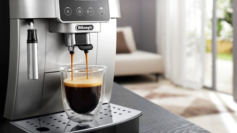 De'Longhi Magnifica Start Silver Black: a compact espresso machine with 13 grind settings, customizable controls, and sleek design.