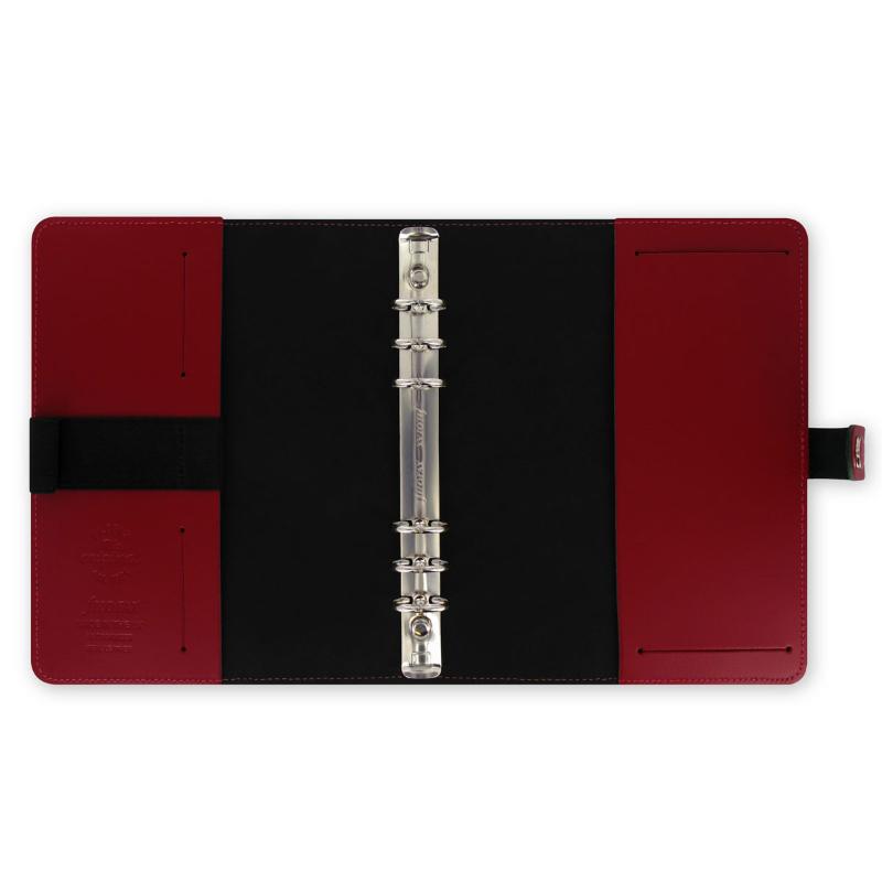 Filofax A5 red leather organizer featuring a durable closure, 25mm rings, multiple pockets, and included planner accessories.