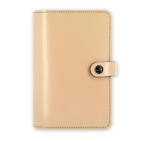 Filofax Original Personal Leather Organiser in Nude, showcasing premium leather, compact size, and stylish organization features.