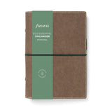 Filofax Eco Essential Personal Organiser in Dark Walnut, vegan material, elastic closure, pen loop, and eco-friendly paper fill.