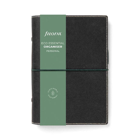 Eco-friendly Filofax personal organiser in ebony with elastic closure, pen loop, and recycled paper for sustainable planning.