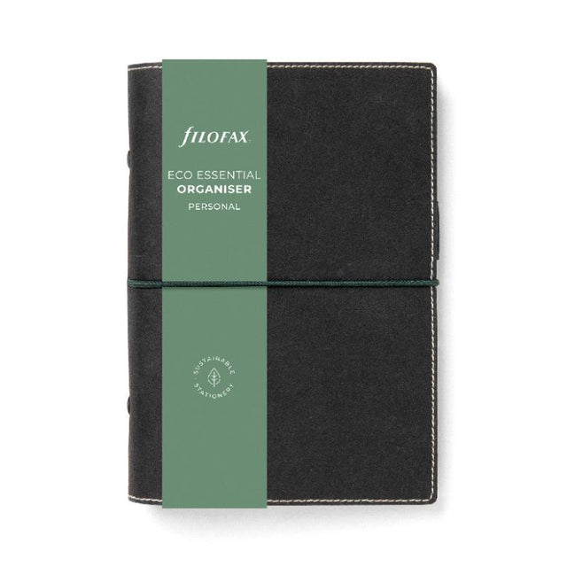 Eco-friendly Filofax personal organiser in ebony with elastic closure, pen loop, and recycled paper for sustainable planning.