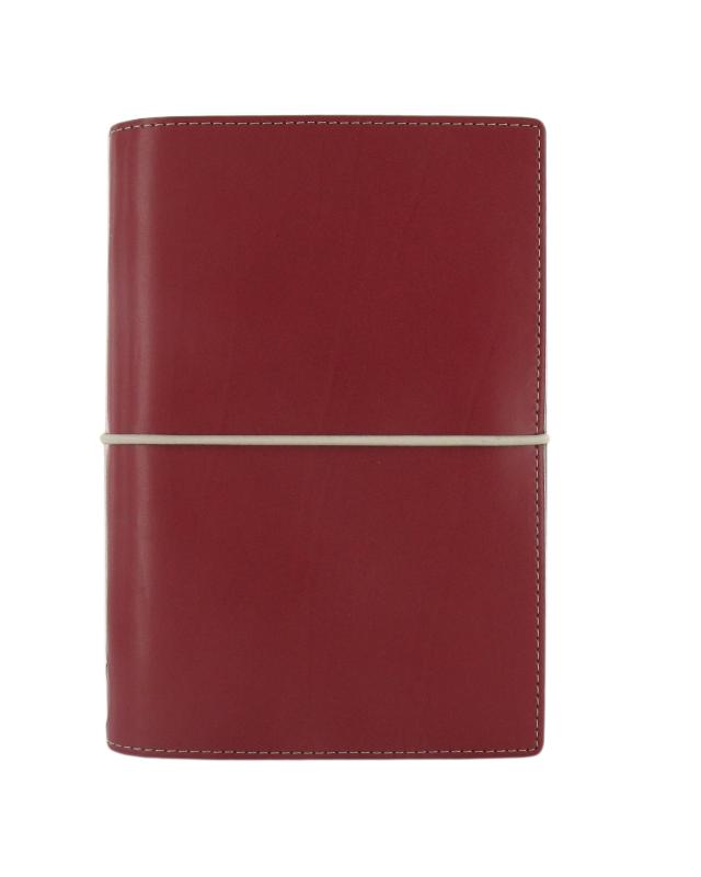 Red faux leather Filofax Organiser Domino Personal with elastic closure, featuring pale stitching and multiple storage pockets.