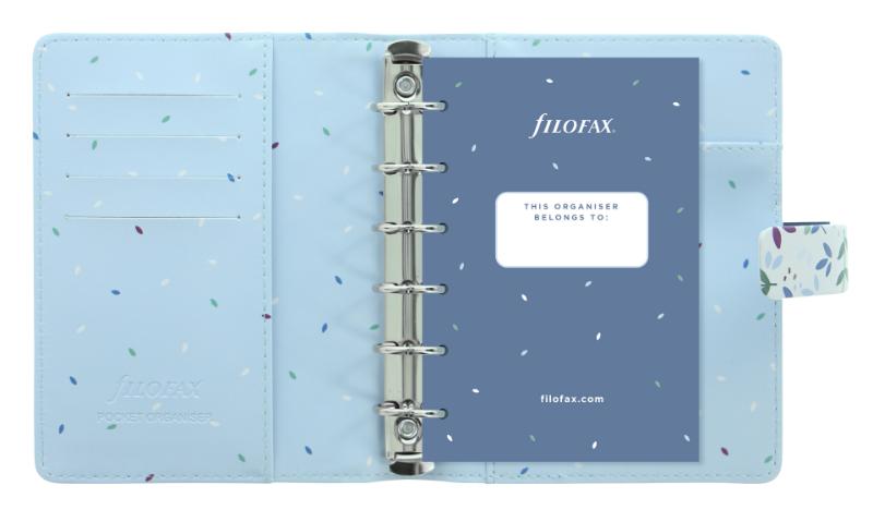 Filofax Garden Pocket Sunrise organiser with a colorful faux-leather cover, gold accents, and a comprehensive planning layout.