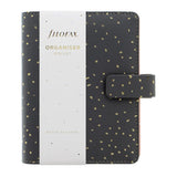 Filofax Charcoal planner with gold accents, featuring a patterned Rose Quartz interior and multiple organizational pockets.