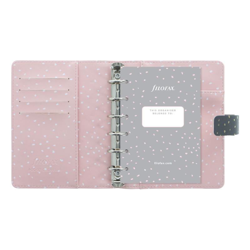 Charcoal faux leather Filofax organiser with gold accents, patterned Rose Quartz interior, and versatile compartments for planning.