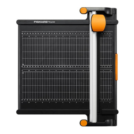 Eco-friendly Fiskars A4 30cm Rotary Trimmer cuts up to 15 sheets, perfect for crafting with precision and sustainability.