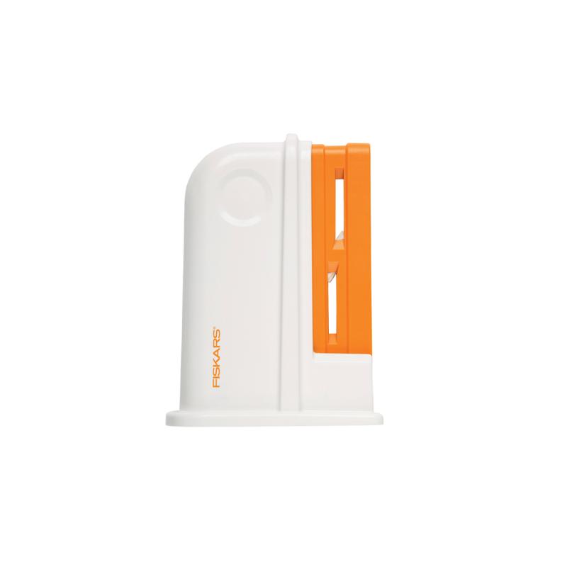 Compact Fiskars Universal Scissor Sharpener restores blade sharpness for all scissors, featuring automatic adjustment and ergonomic grip.