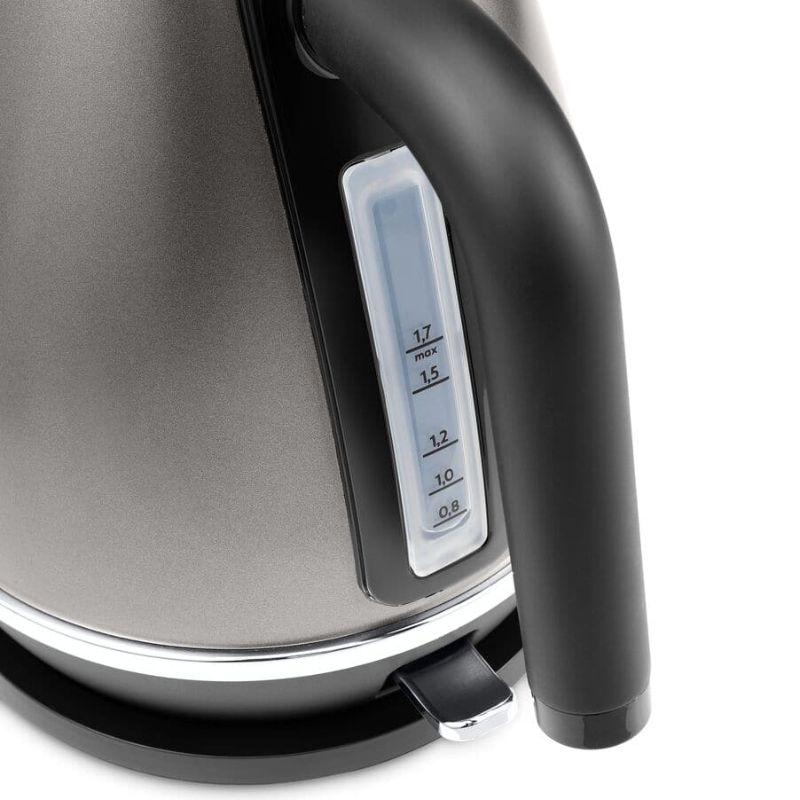 De'Longhi Distinta Titanium Kettle in matte metallic finish, 1.7L capacity, cordless design, automatic shut-off, and modern style.