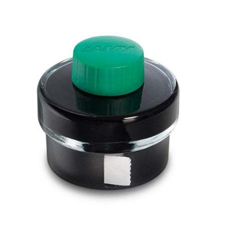 Lamy T52 50ml green ink bottle with ink residue basin and built-in blotting paper for fountain pen enthusiasts.