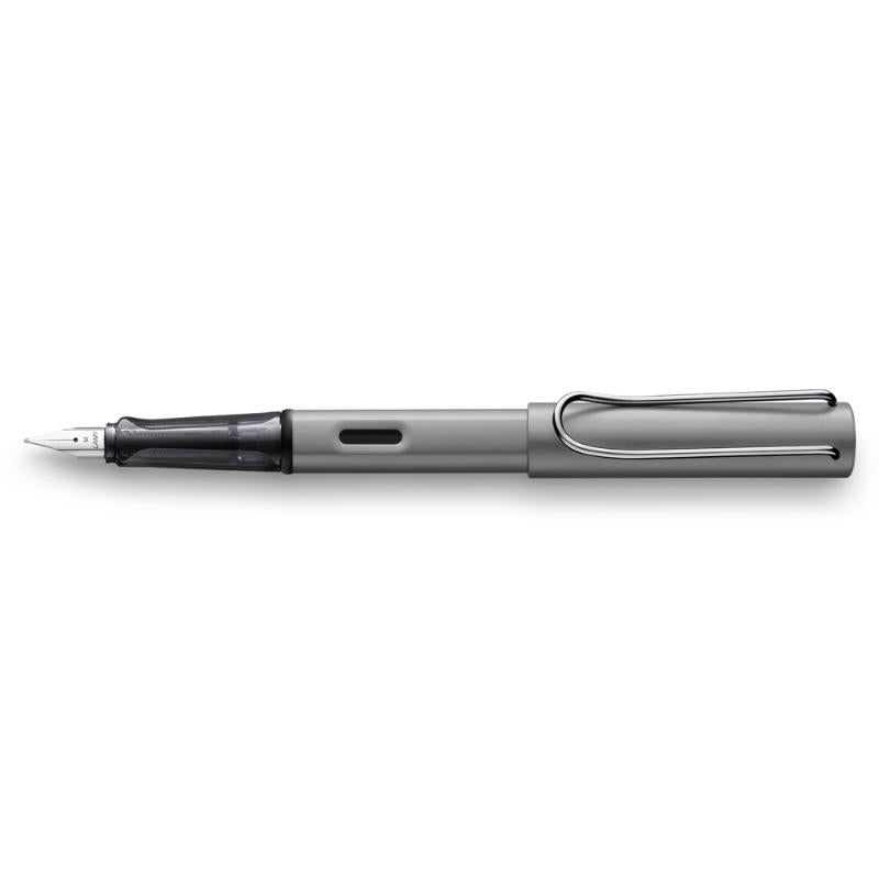 Lamy Al-Star Fountain Pen in graphite, featuring a polished steel medium nib and ergonomic design for comfortable writing.