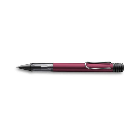 Dark purple Lamy Al-Star ballpoint pen featuring a lightweight aluminum body and ergonomic grip for comfortable writing.