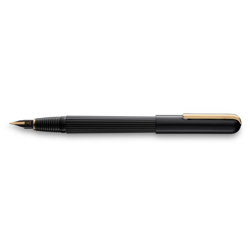 Elegant Lamy Imporium Fountain Pen in Black and Gold, featuring a unique guilloche design and a smooth 14-carat gold nib.