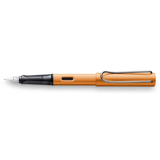 Lamy Al-Star Fountain Pen in metallic bronze with ergonomic grip and extra fine nib for elegant, precise writing.