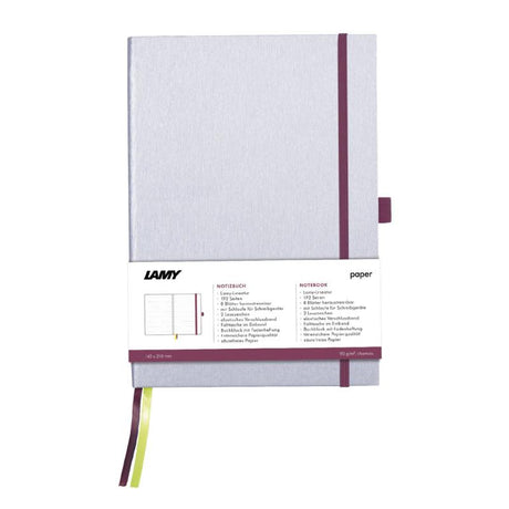 Elegant silver A5 Lamy notebook with purple edge, featuring hard cover, 192 bleedproof pages, and pen loop for convenience.