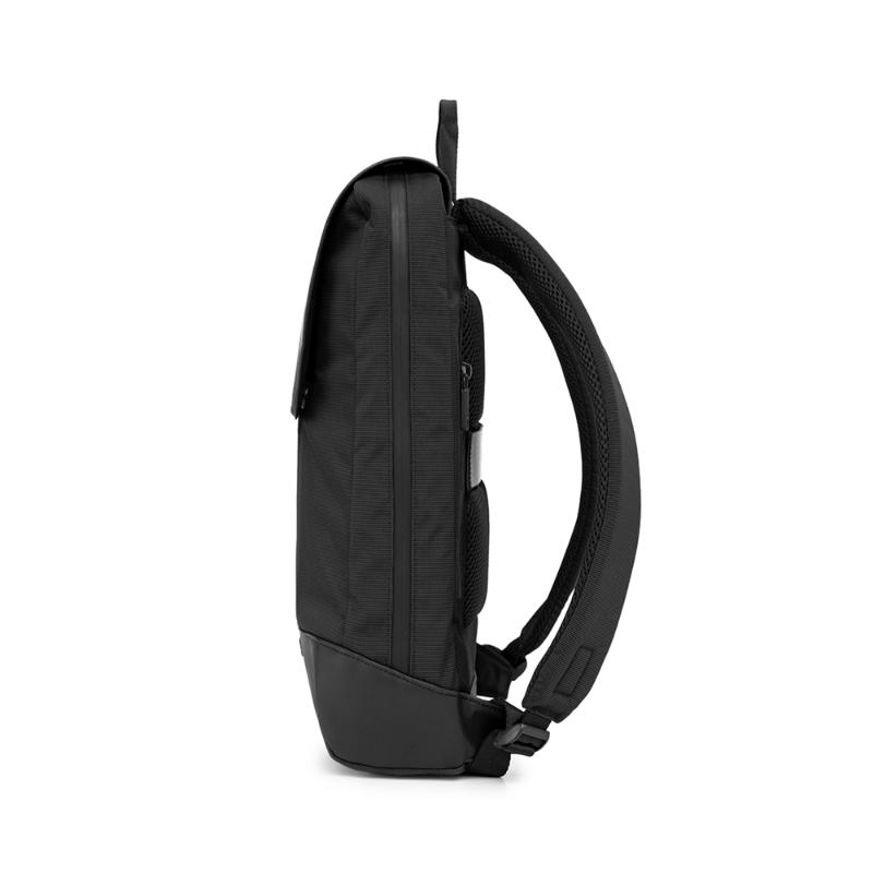 Sleek black Moleskine Metro Slim Backpack with multiple compartments, magnetic closure, and breathable back for urban adventures.