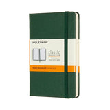 Moleskine Pocket Notebook in Myrtle Green, featuring ruled ivory pages, elastic closure, and expandable inner pocket for travel.