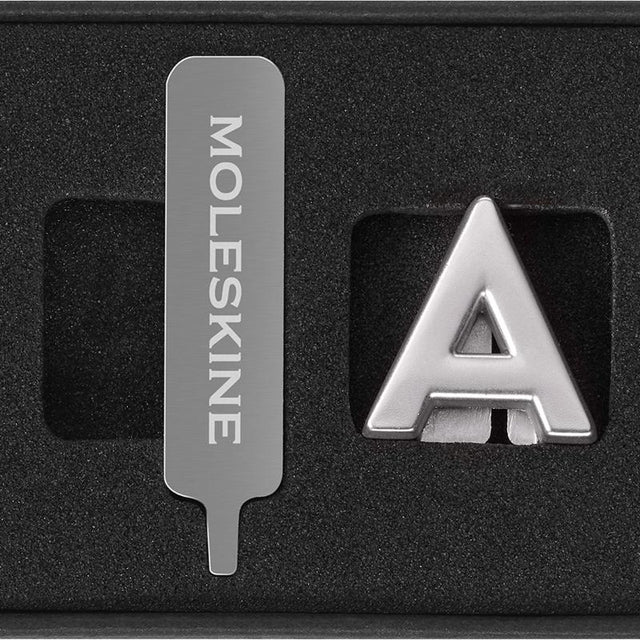 Stylish Moleskine Pins A Silver made from Zinc Alloy, perfect for personalizing your notebook with initials or inspiring words.