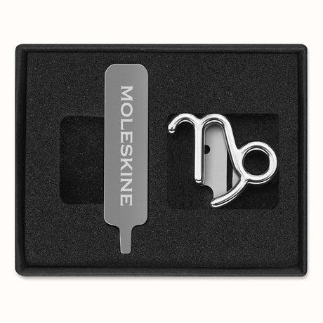 Silver Capricorn zodiac pin for Moleskine notebooks, adding elegance and personality to journaling and planning.