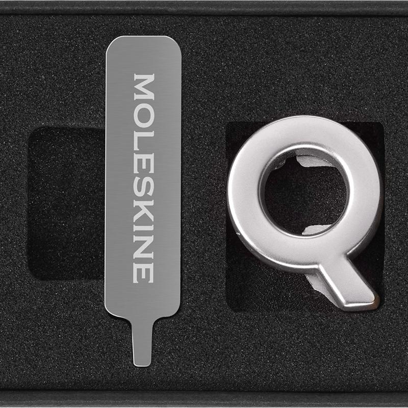 Moleskine Pins Q Silver, customizable zinc alloy pins for personalizing notebooks with unique letters and initials.