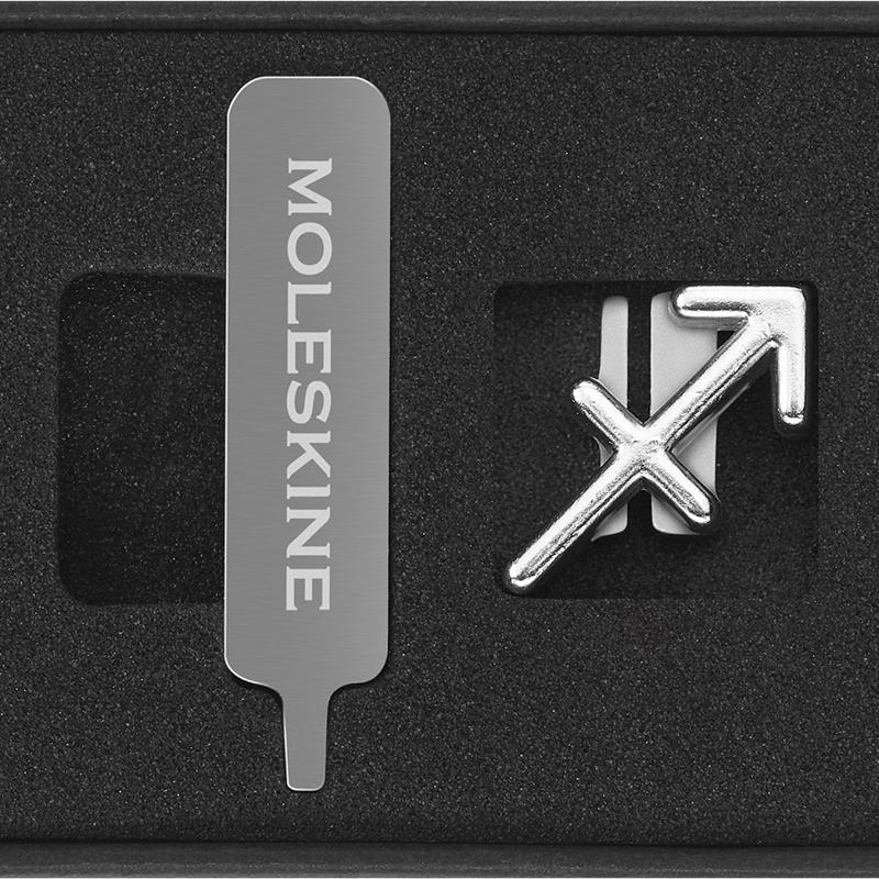 Moleskine Pins Sagittarius Silver featuring a shiny silver zodiac symbol for personalizing notebooks or planners.