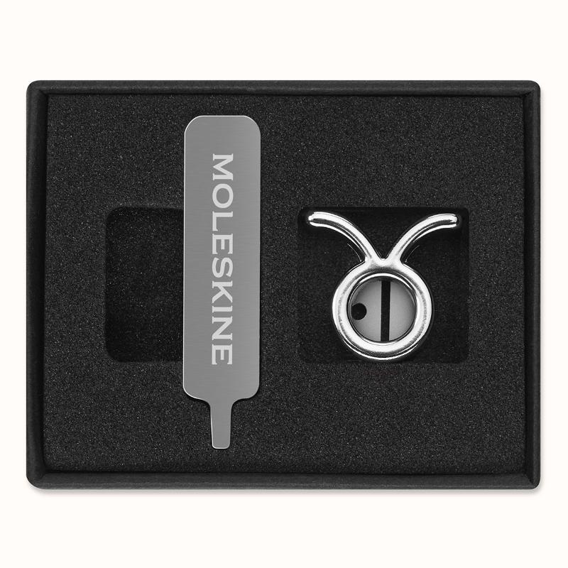 Moleskine Taurus silver pin, an elegant zodiac accessory to personalize notebooks and planners with astrological flair.