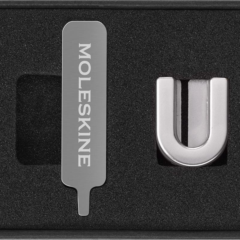 Stylish Moleskine Pins U Silver for personalizing notebooks, crafted from durable zinc alloy for lasting appeal.